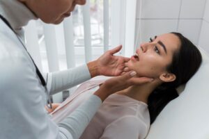 doctor-checking-patient-s-mouth